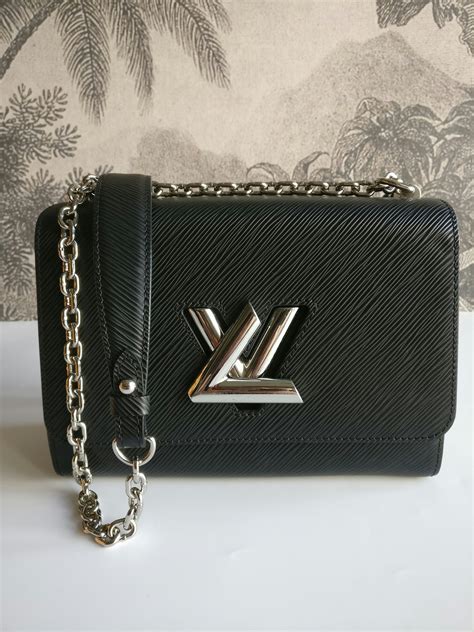 lv twist woc|Twist: LV Brand Mark Twist Lock Handbags .